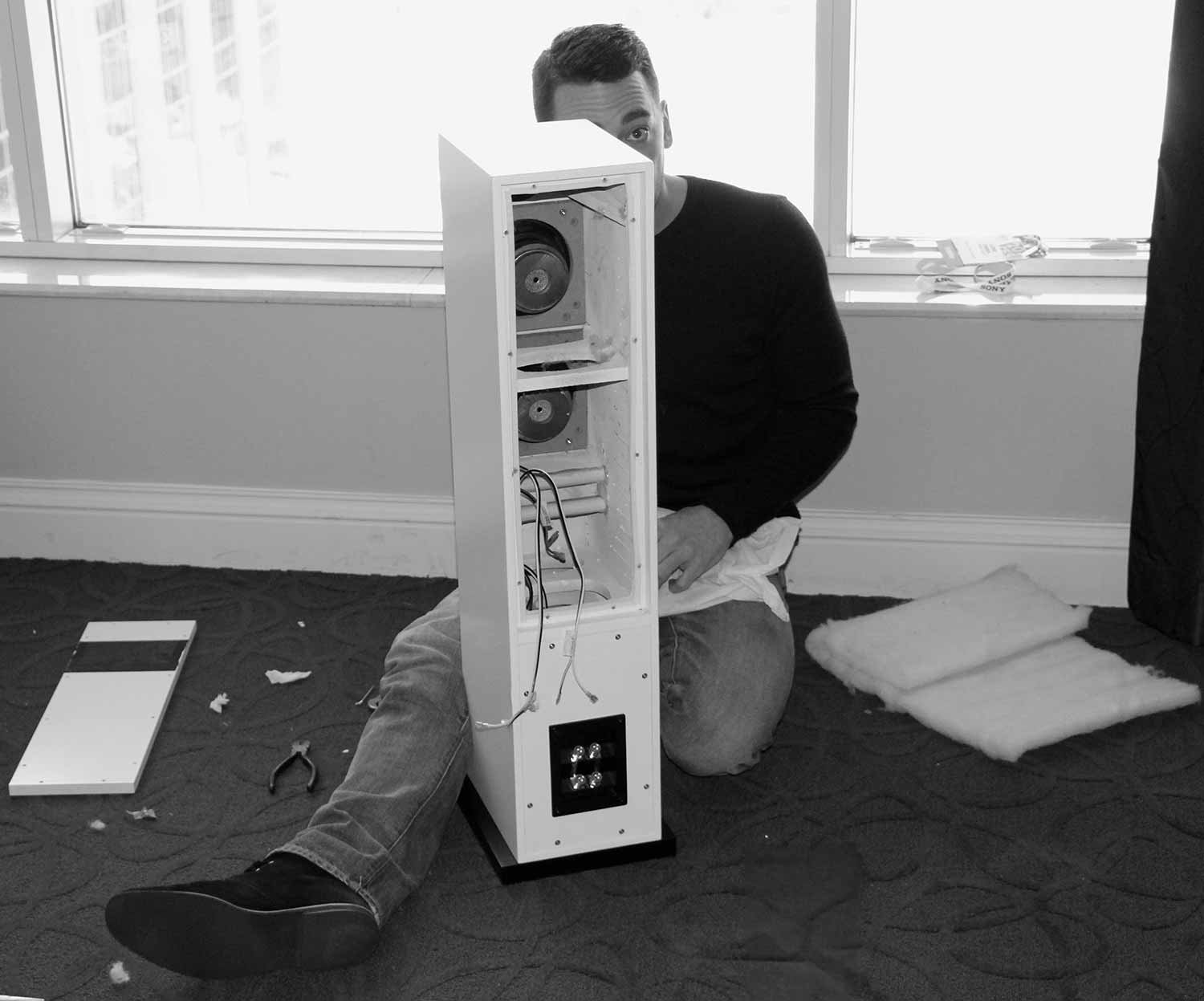 Luke rebuilding a speaker during CES